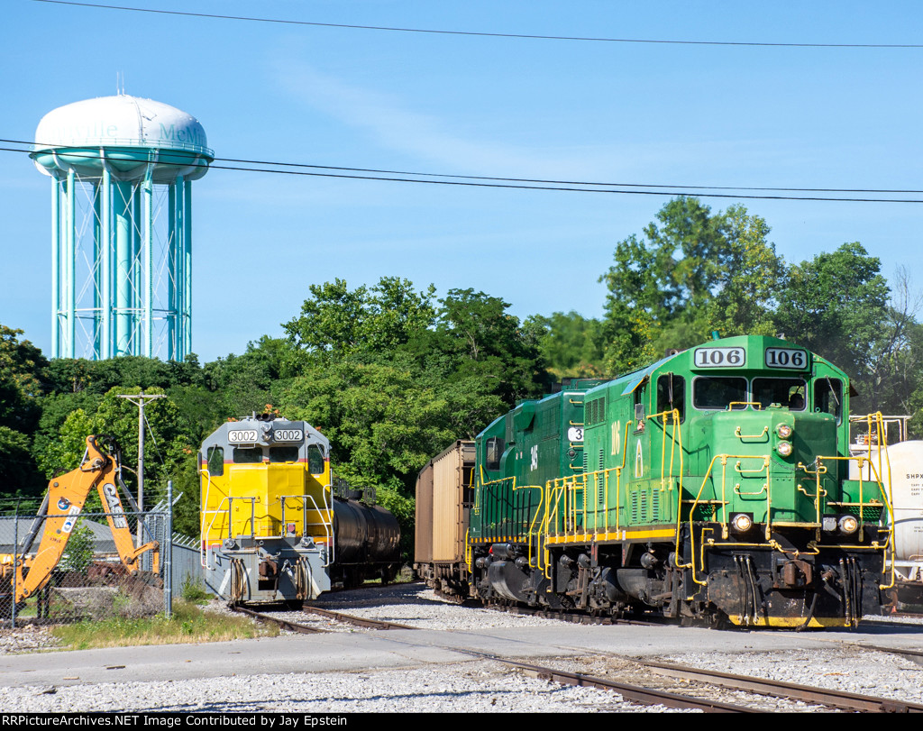 CFWR 105 and 3002 pose with the McMinnville Water Tower